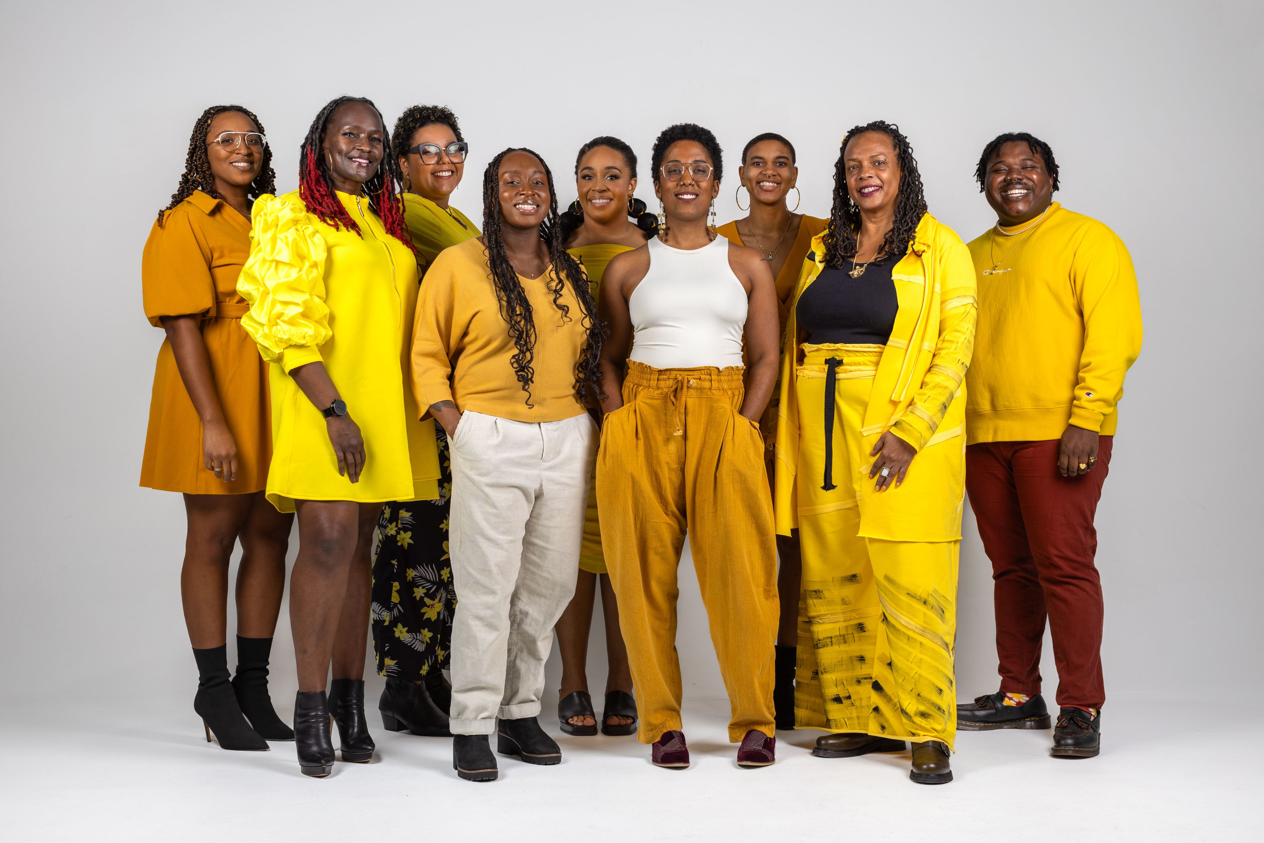 Soul 2 Soul Staff members wearing all yellow outfits